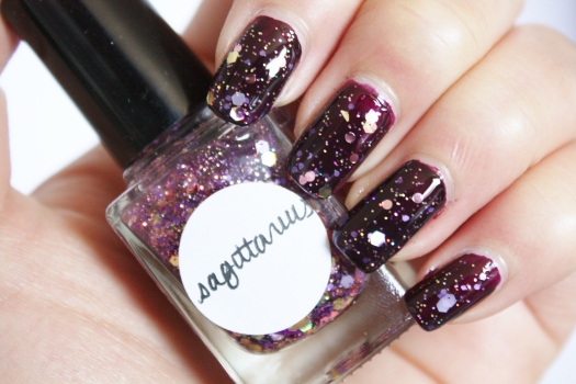 Sagittarius is a beautiful blend of multi-hued purple, pink, gold, and holographic gold glitter in a pink tinted clear base