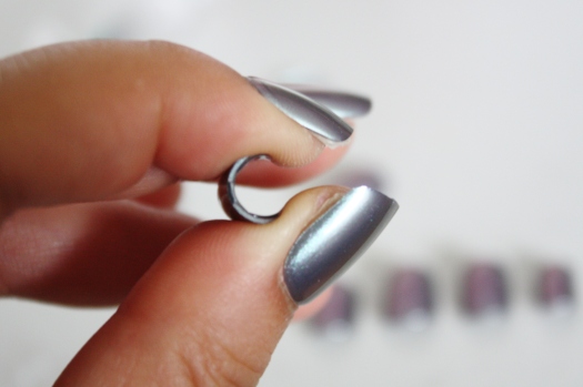 Step 2.5: Roll nails gently between fingers to curve them more to natural nail shape
